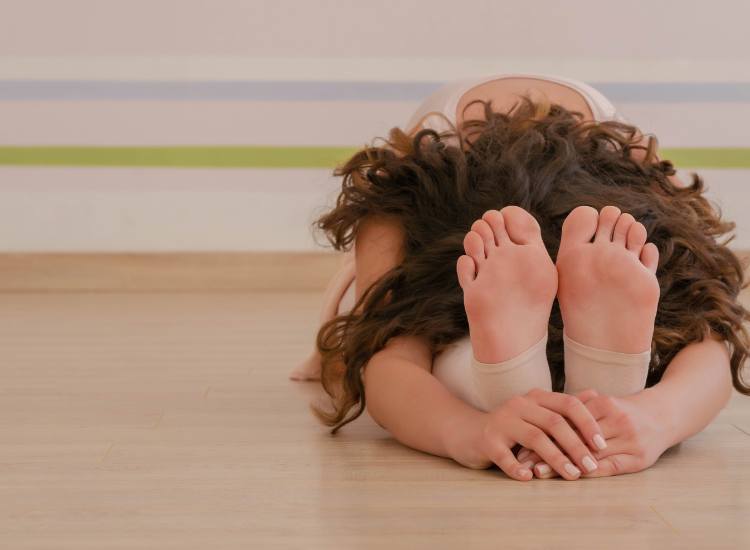 3. Paschimottanasana (Seated Forward Bend)